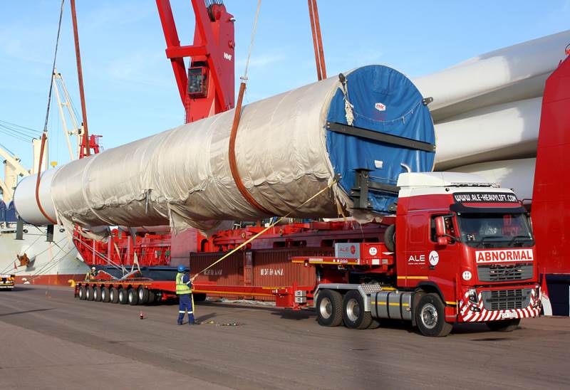 Loading a tower piece on the 8-axle Nooteboom semi low-loader at Saldanha bay (Western Cape), 140 km northern of Cape Town)